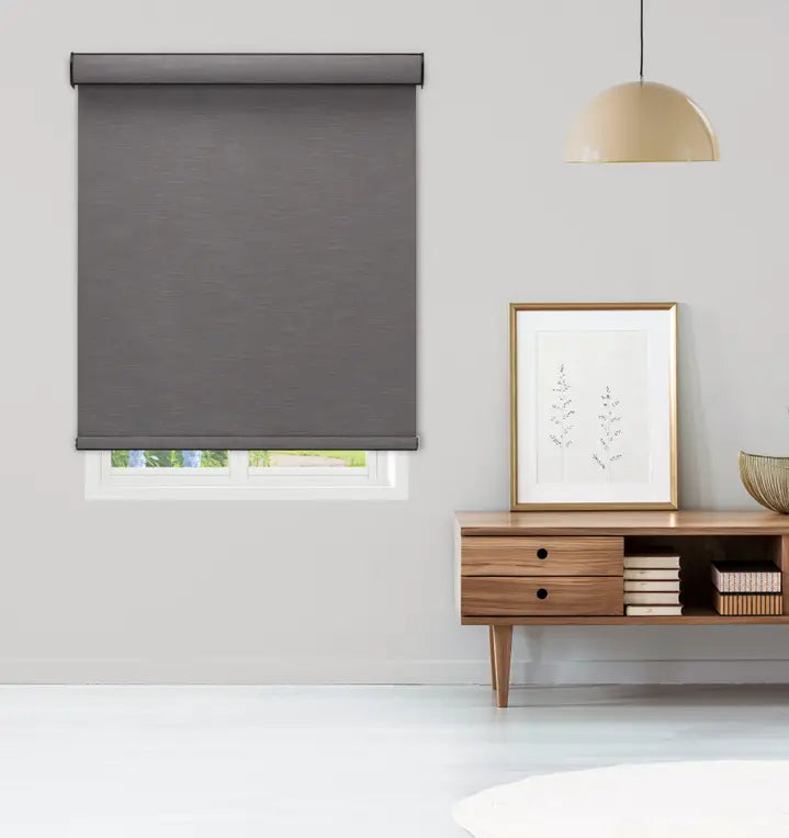 Gray Mojave blackout roller shade installed in a modern living room window