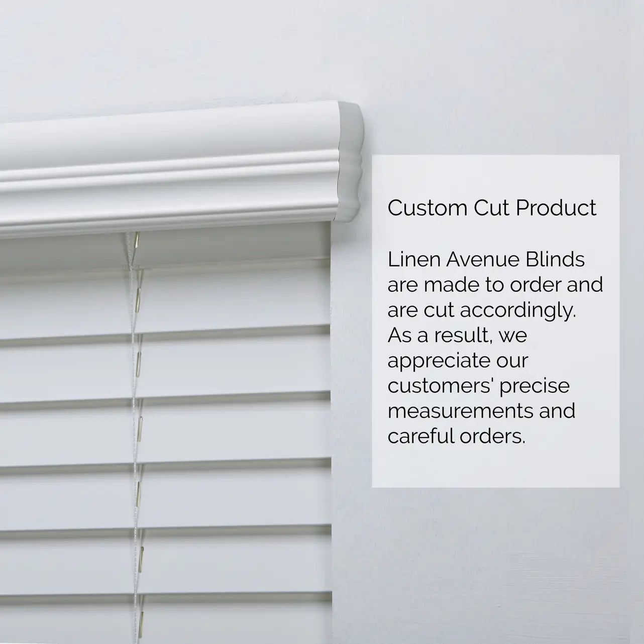 Close-up of 2" Cordless Faux Wood Blind headrail, custom cut to size