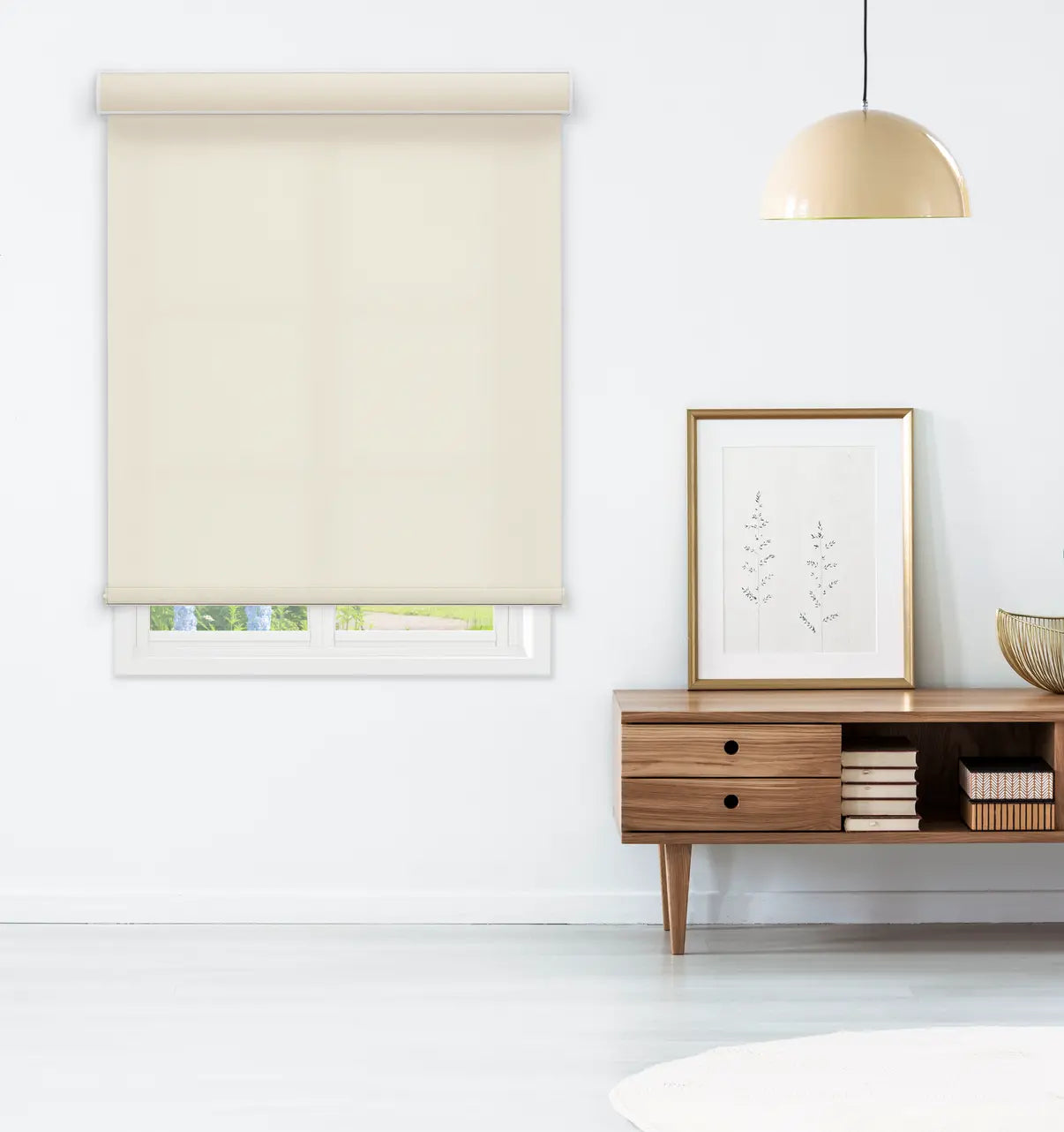  straight-on)Coastal Light Filtering Roller Shade in Sandbar Cream installed above a living room console table