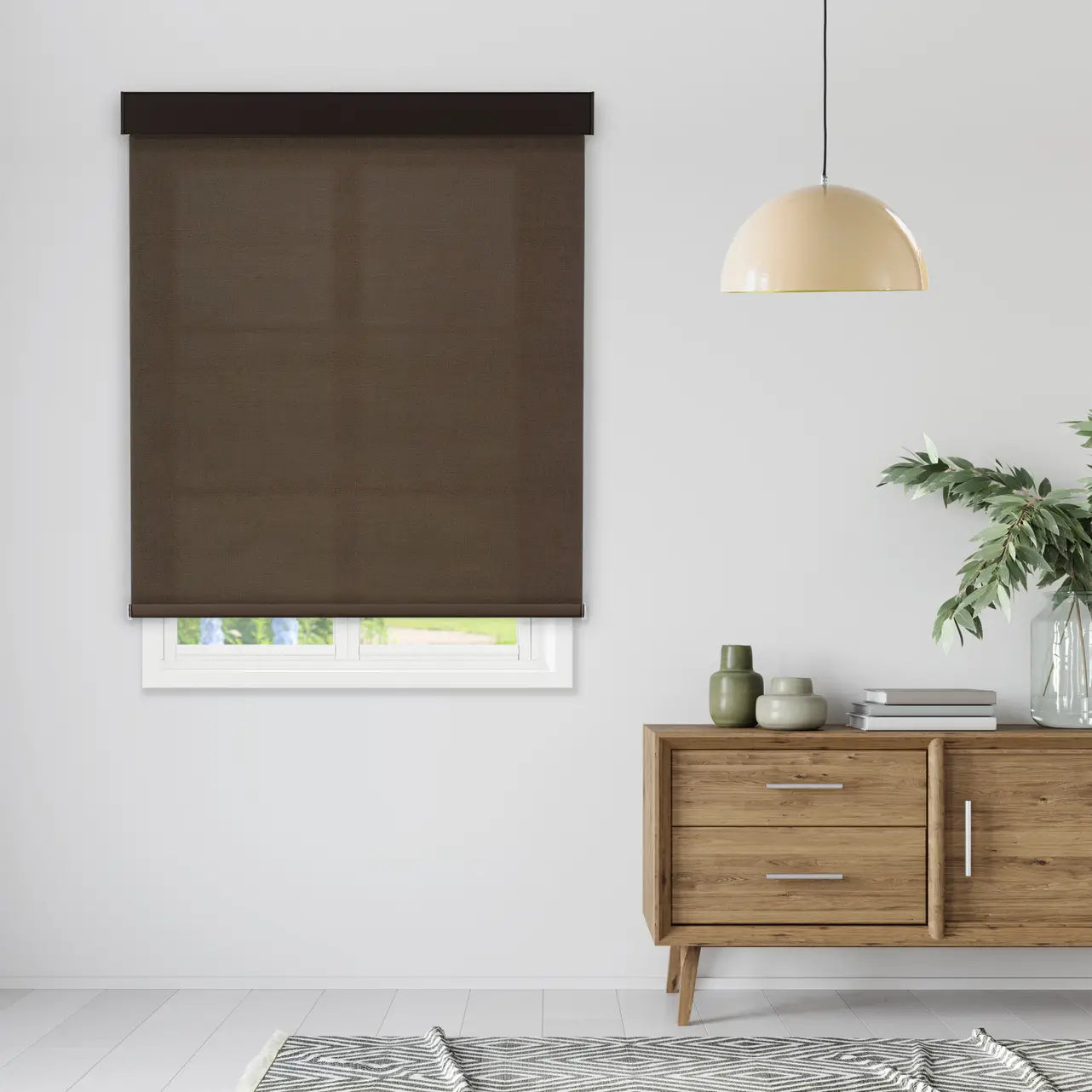 5% Solar Screen Roller Shade in coffee, styled in a living room above a wood console table